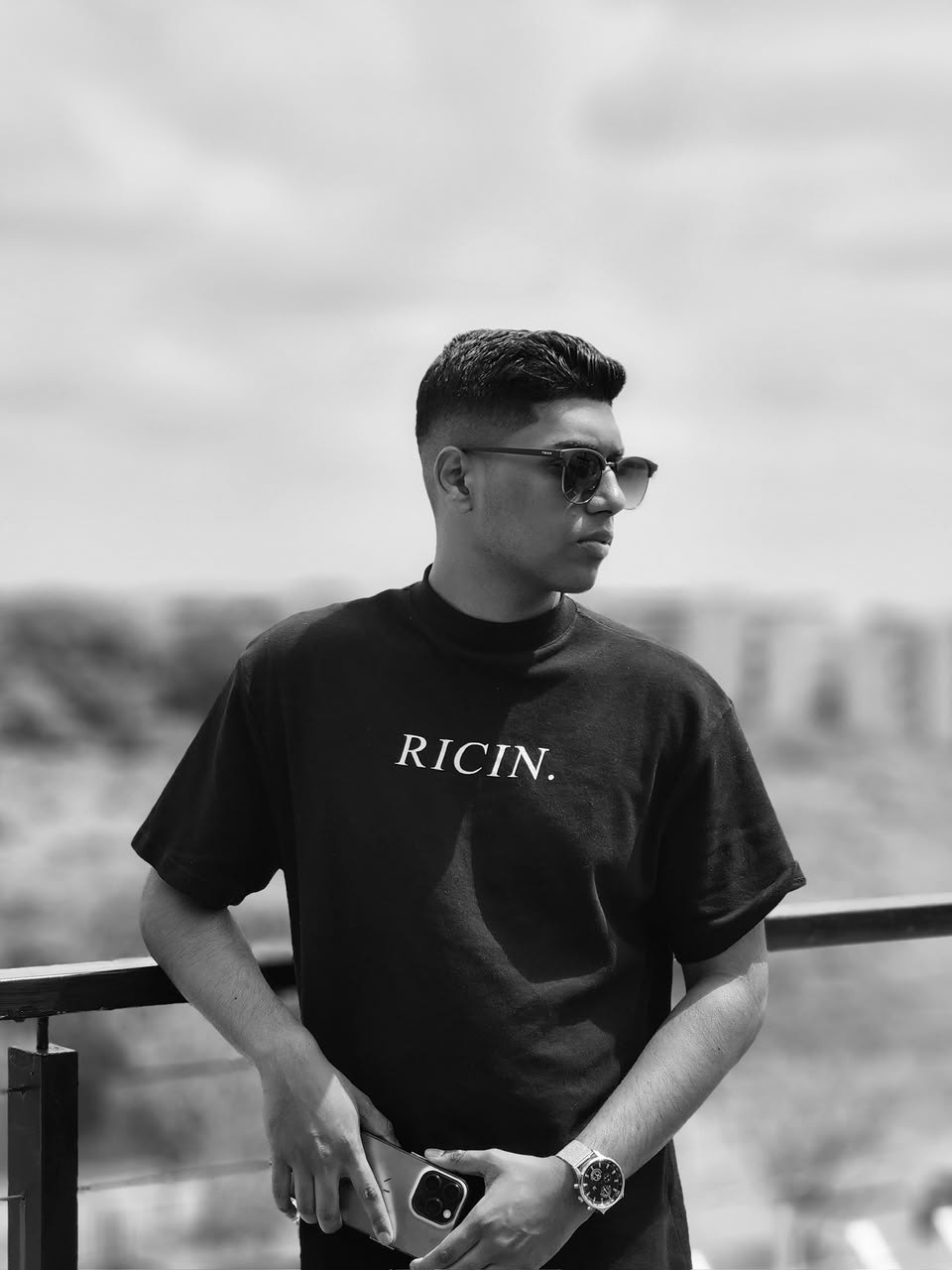 Founder of Ricin Xpress wearing a Ricin branded t-shirt