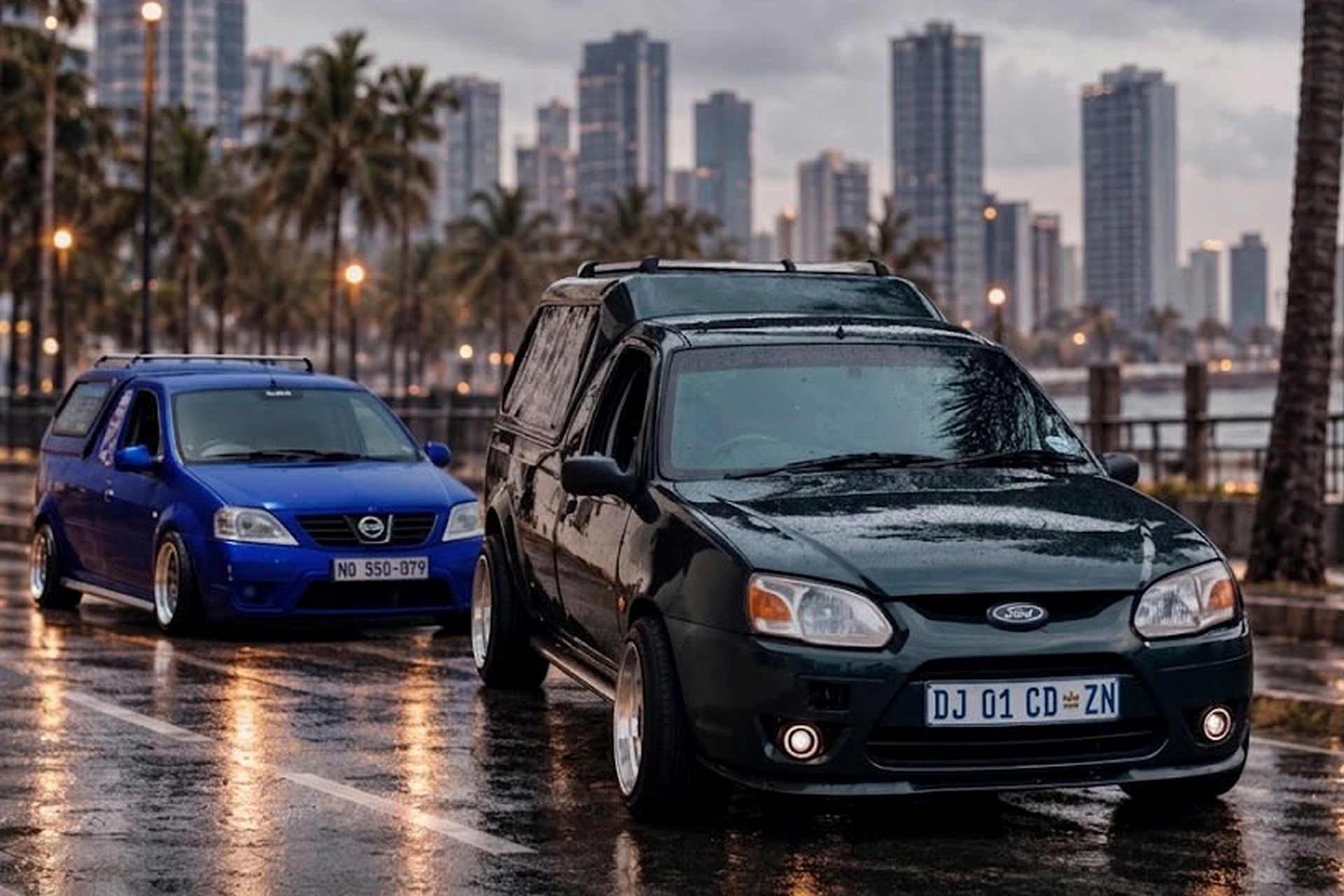 Ricin Xpress delivery cars on a wet Durban waterfront road